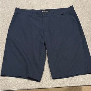 Travis Mathew men’s performance navy golf shorts.